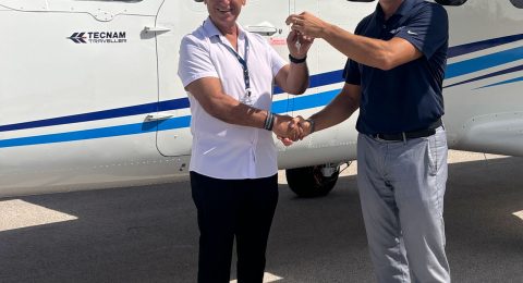 Anthony Marinello and Francesco Sferra handing keys of the P2012 Tropic Air